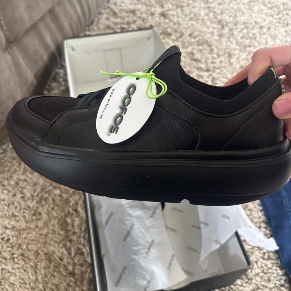 OOFOS Women's Slip-On Black Leather Casual Sneakers - Picture 4 of 7